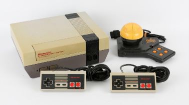 Nintendo Entertainment System (NES) with 2 controllers and power supply Also included in this lot