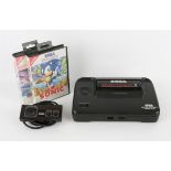 Sega Master System II Console with controller, power supply and 2 boxed games Games include: Sonic