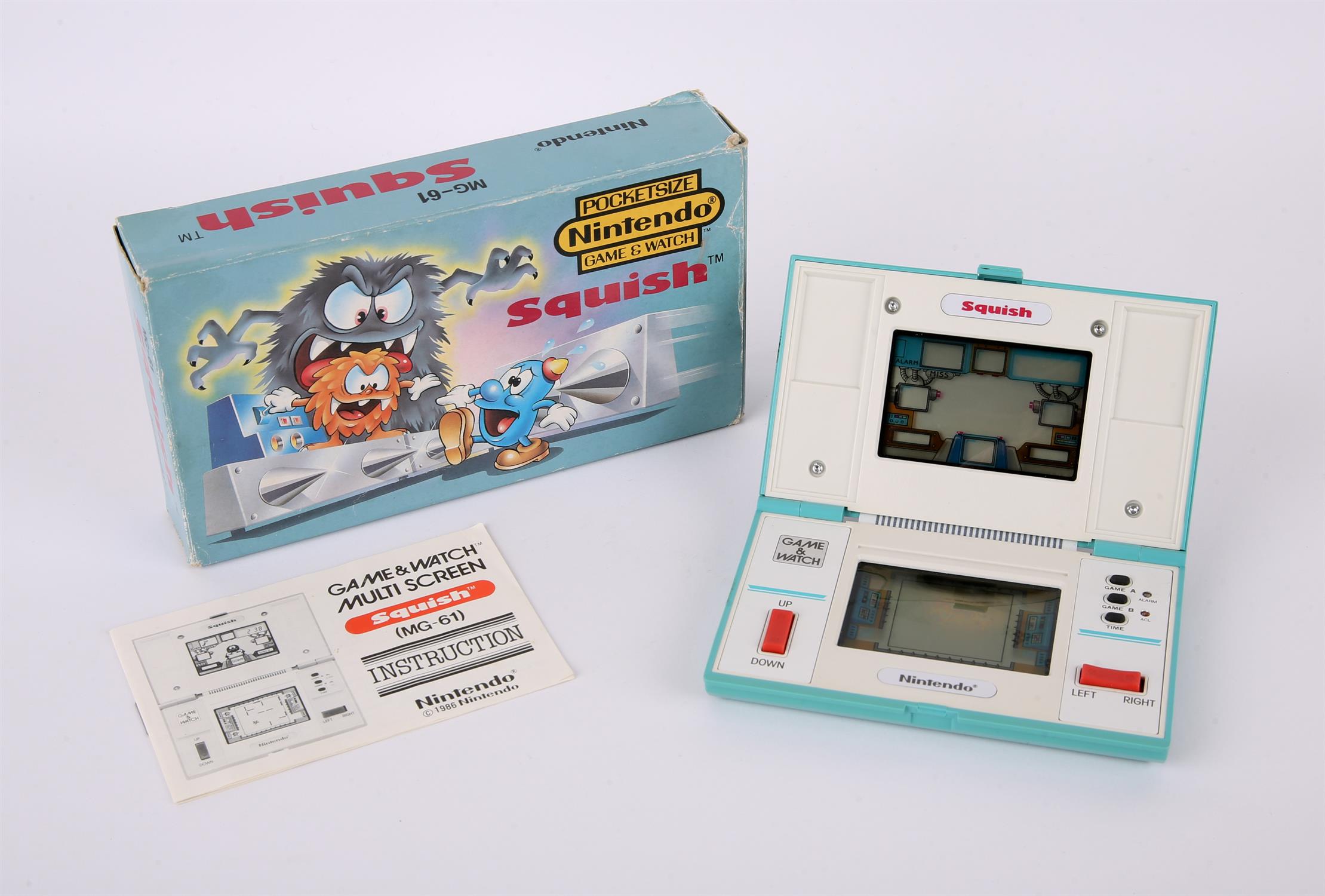 Nintendo Game & Watch Squish [MG-61] handheld console from 1986 (complete and boxed) Item is