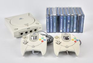 Sega Dreamcast console with 2 controllers, official power supply and 11 games Games include: Ecco