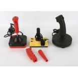 An assortment of 1980s joysticks Includes: Wico Command Control joystick (with 3 alternate