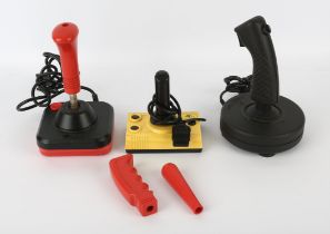 An assortment of 1980s joysticks Includes: Wico Command Control joystick (with 3 alternate