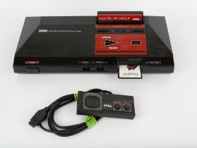 Sega Master System Console with instruction manual, controller, power supply and 2 games Games