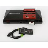 Sega Master System Console with instruction manual, controller, power supply and 2 games Games