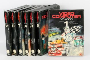An assortment of Video Computer (VC 4000) game cassettes Game cassettes include volumes 1, 2, 3, 4,