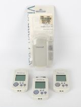 3 Visual Memory Units (VMU) in an official Sega Dreamcast Visual Memory box with an official