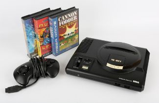 Sega Mega Drive Console with controller, power supply and 3 games Games include: Street Fighter 2: