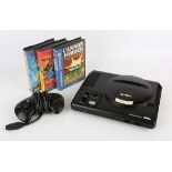 Sega Mega Drive Console with controller, power supply and 3 games Games include: Street Fighter 2: