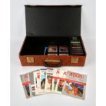 An assortment of 14 loose Atari games, with their corresponding manuals All items come in a brown