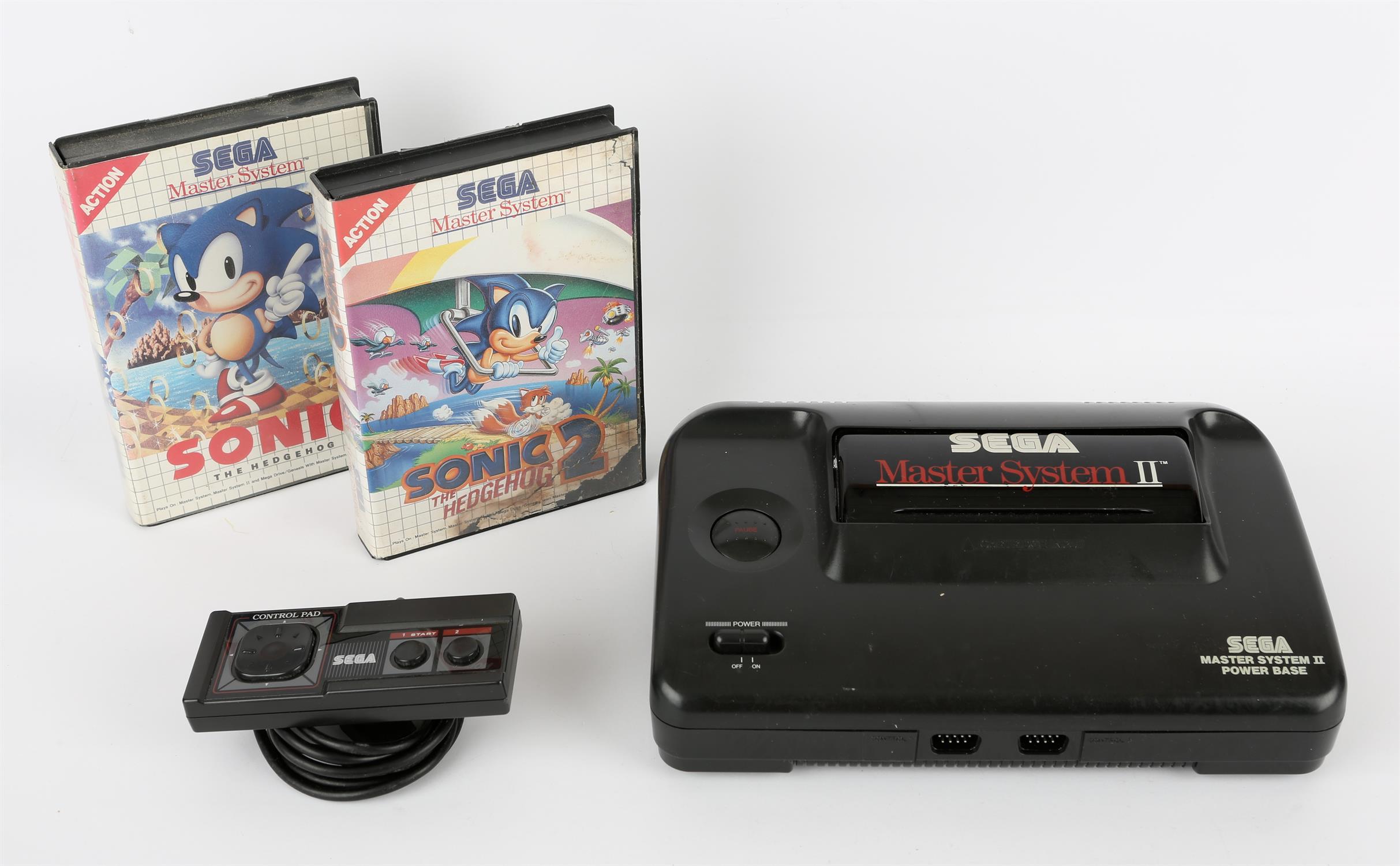 Sega Master System II Console with controller, power supply and 2 boxed games Games include: Sonic