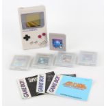 Nintendo Game Boy with 5 games (PAL) Games include: Kid Icarus: Of Myths and Monsters,