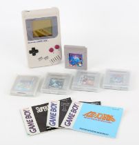 Nintendo Game Boy with 5 games (PAL) Games include: Kid Icarus: Of Myths and Monsters,