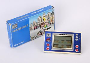 Nintendo Game & Watch Manhole [NH-103] handheld console from 1983 (missing instructions/inserts)