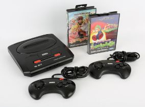 Sega Mega Drive II Console with 2 controllers, power supply and 2 games Games include: Talmit's