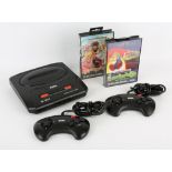 Sega Mega Drive II Console with 2 controllers, power supply and 2 games Games include: Talmit's