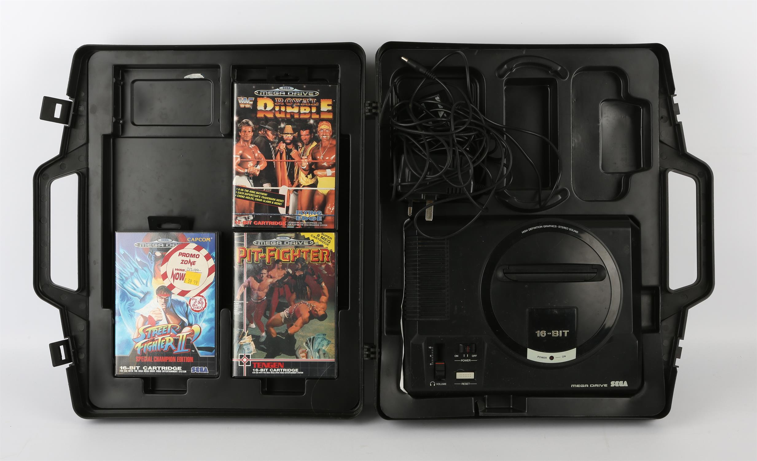 Sega Mega Drive [console only] with AC adapter and three games Games include: Street Fighter II: