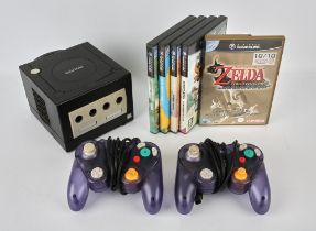 Nintendo GameCube Console [Black] with 2 third-party controllers and 5 games (PAL) and US power