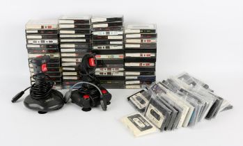 A large assortment of Commodore 64 cassette games (approx. 90) a Cheetah 125+ joystick and a