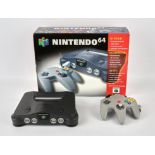 Nintendo 64 Console (PAL) with grey controller, power supply and instructions/inserts Console and