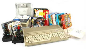 A large box of Atari games, accessories and peripherals Includes: 1 Atari 520ST system 16 boxed