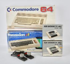 A large assortment of Commodore machines and accessories Includes: Commodore 64 (with third party