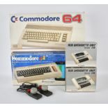 A large assortment of Commodore machines and accessories Includes: Commodore 64 (with third party