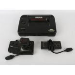 Sega Master System II console (loose) with power supply (x2), official controller and Sega Control