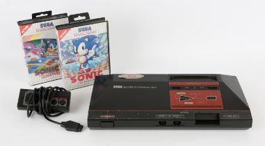 Sega Master System Console with controller, power supply and 2 boxed games Games include: Sonic