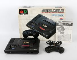 Japanese Sega Mega Drive boxed console (NTSC-J) Console is complete, boxed and untested Contents