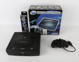 Sega Saturn Model 2 boxed console with controller All items are used and untested