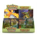 Pokemon TCG. Set of 4 sealed Magma vs. Aqua deck tins, all artworks, in dealers display box from