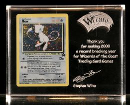 Pokemon TCG. Wizards of the Coast Commemorative acrylic piece with an encapsulated holographic