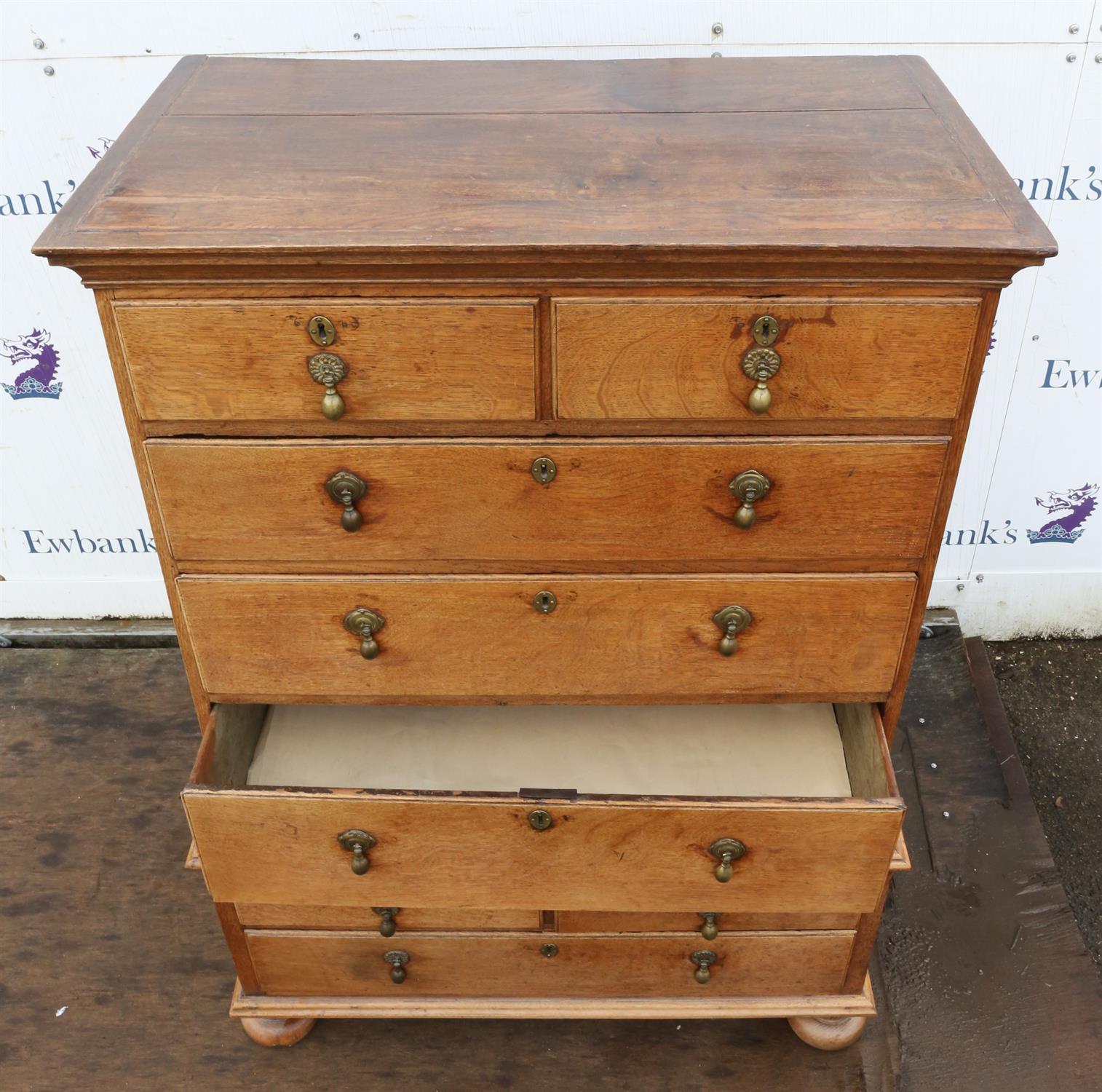 A George II oak chest on chest, sides panelled, on later bun feet, H 132cm, W 102cm, D 58cm - Image 2 of 3