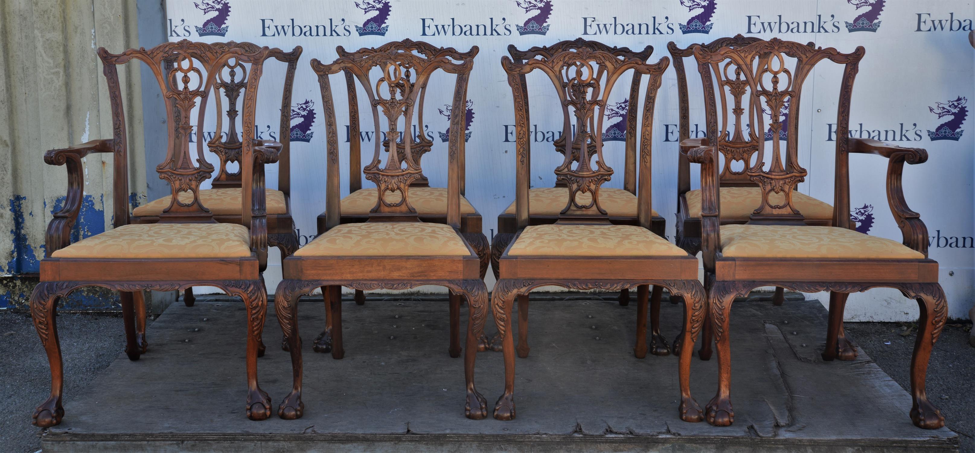 Eight George III style mahogany dining chairs, with two armchairs, the backs with pierced splats,