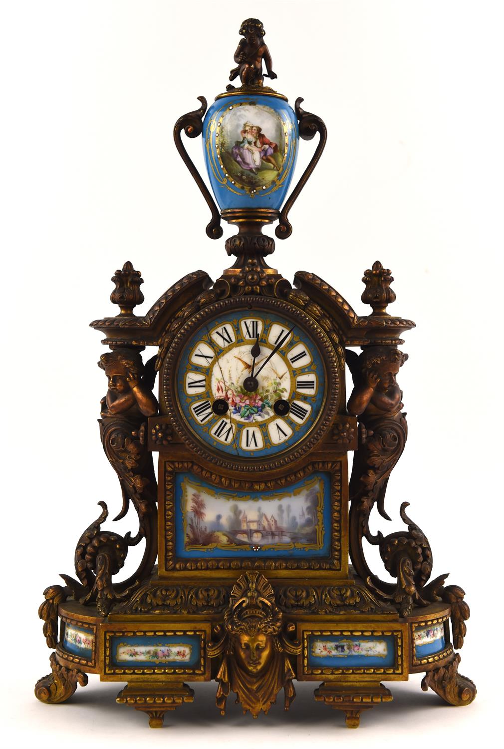 A late 19th century French Ormolu and porcelain mounted mantel clock, with urn finial and painted - Image 2 of 2