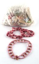 A large group of costume jewellery with a pair of antique Western Germany earrings,