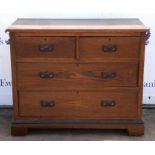 An Edwardian oak dressing chest of drawers, formerly with mirror surmount, the bracket feet with