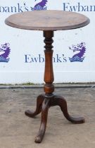 A Victorian walnut tripod table, the burr walnut radial veneered top on a baluster stem and tripod