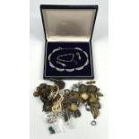 A collection of costume jewellery including a paste necklace earrings and bracelet set