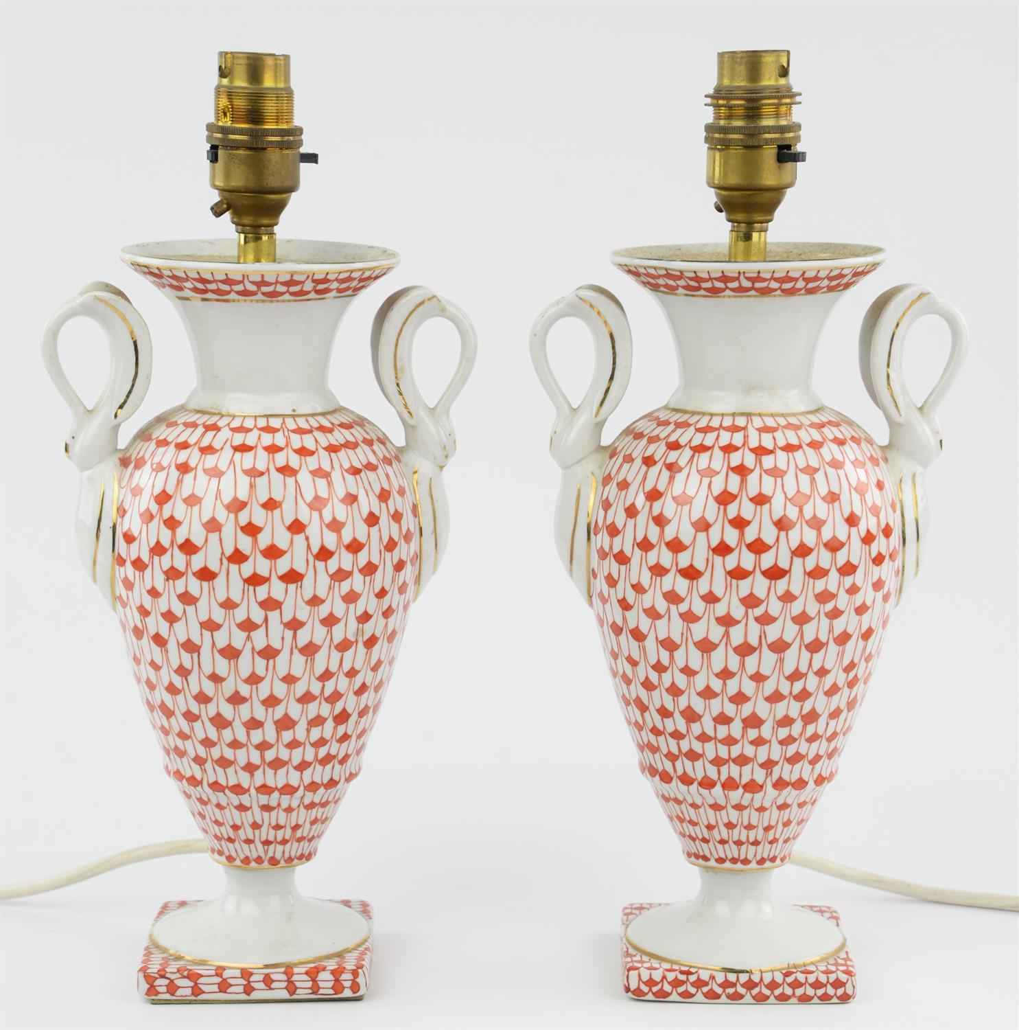 A pair of Herend style porcelain table lamps with swan neck handles, 25cm high. (2)