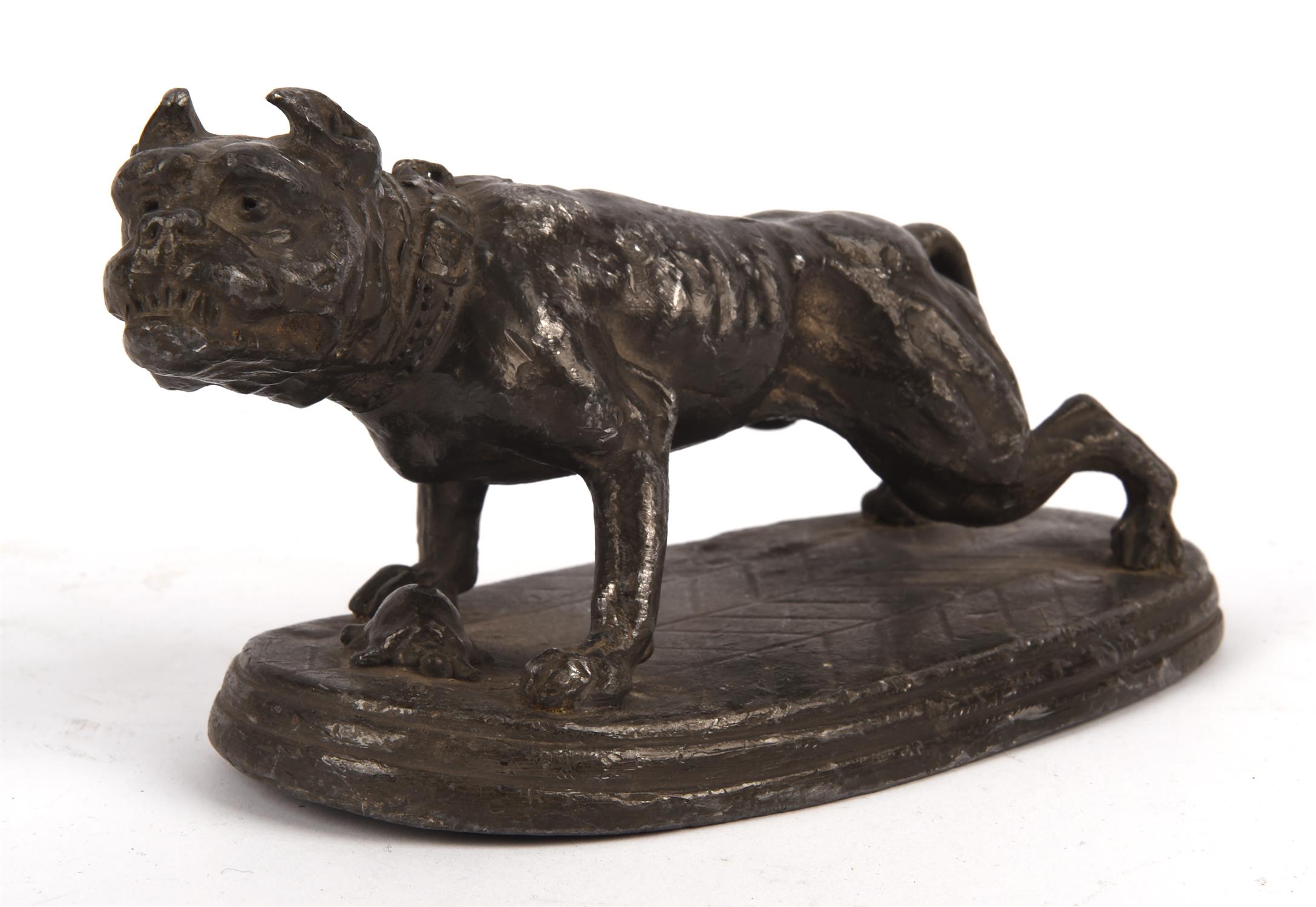 An early 20th century lead model of a bulldog standing guard over a tortoise raised on an oval base,