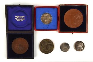 Quantity of silver and bronze medallions, some cased