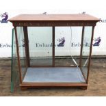 Fry's Chocolate sweet display cabinet, with brass brackets and glass shelves, on bracket feet,