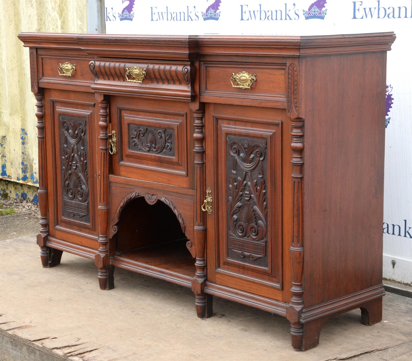 A late Victorian walnut sideboard, of breakfront form, doors scroll and anthemion carved, - Image 2 of 3