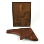 T Thomas & Son, 1916, leather pistol holder and a framed photo, 27 x 20cms