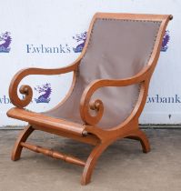 A Colonial teak planter's chair, 1st half 20th century, formerly caned, now with leatherette,