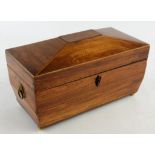 A Regency kingwood twin division tea caddy of sarcophagus form, with twin lion ring handles and