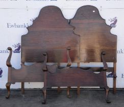 Two 1930s walnut single bed ends, no rails, arched and with cabriole legs, H 134cm, W 92cm