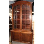 A French Louis XVI style oak display cabinet cupboard, early 20th century, in two parts,