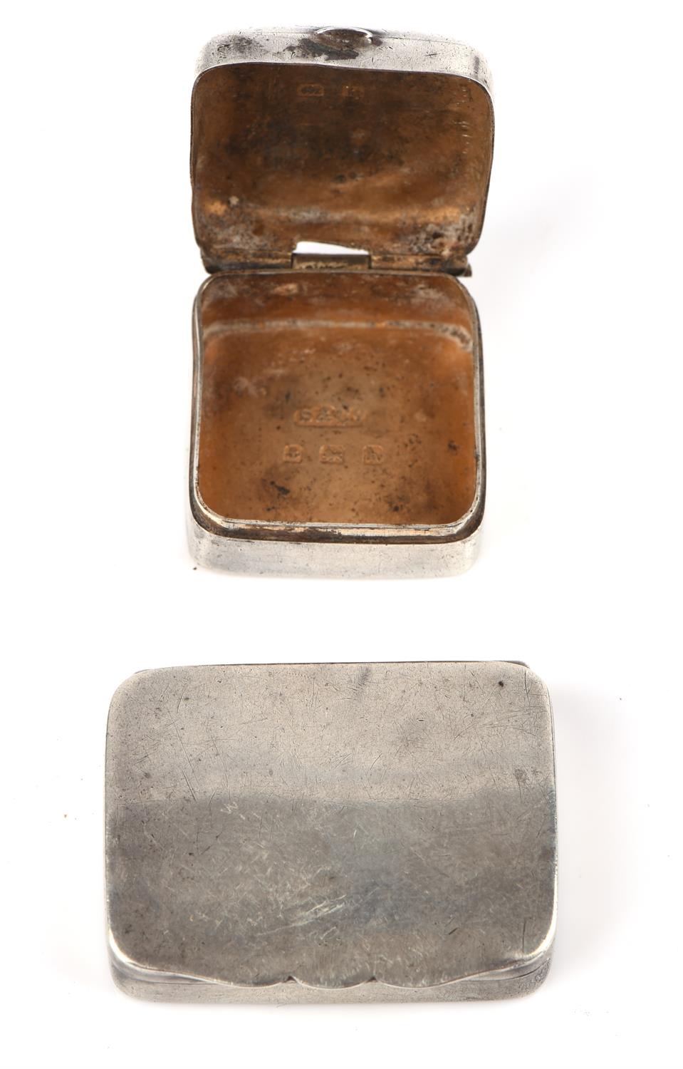 Two Edwardian silver boxes, one a snuff box , Birmingham, 1907 and the other a pill box, 1909